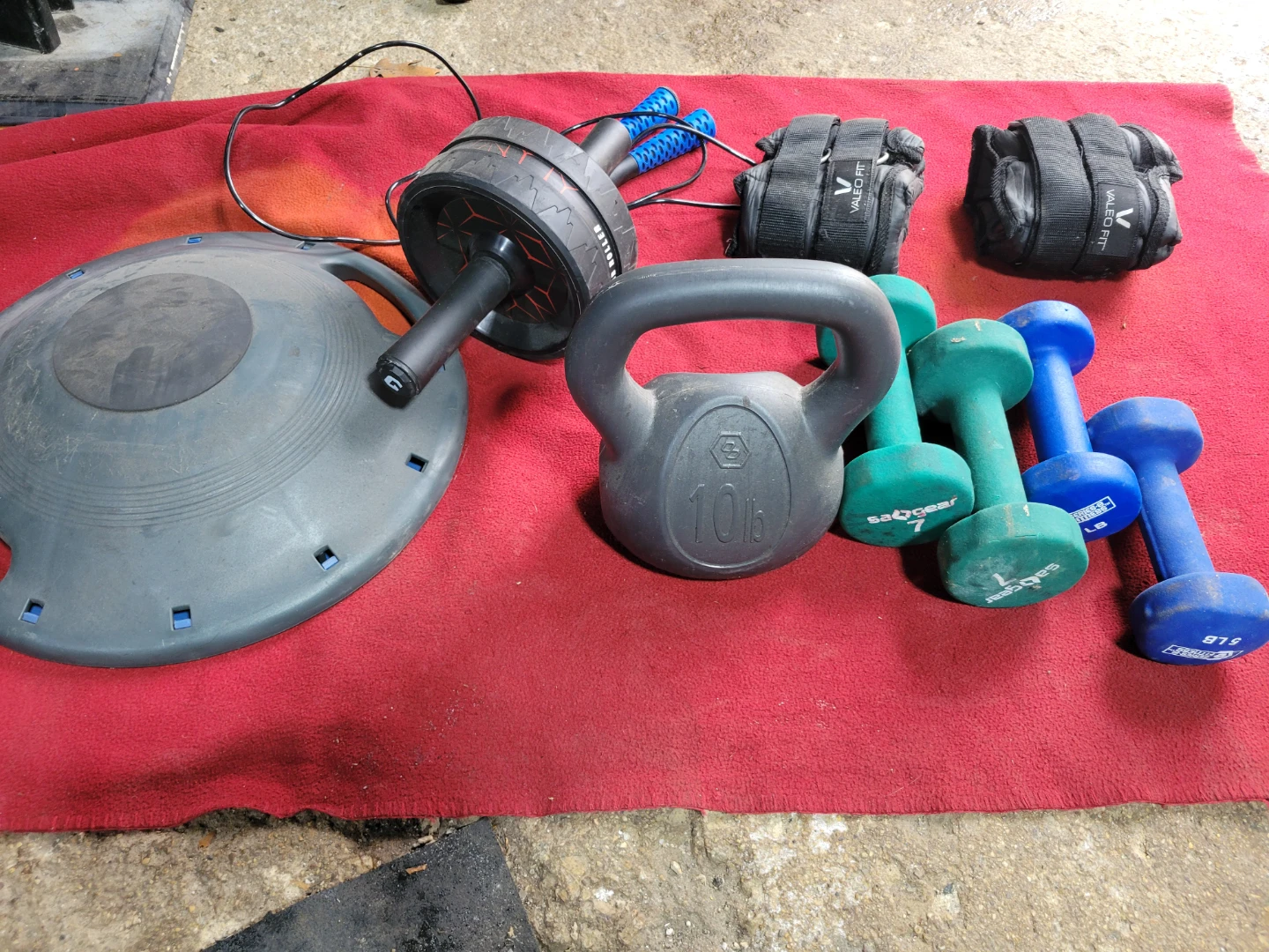 10LB KETTLEBELL  5s 7s NEOPRENE DUMBBELLS  AB ROLLER. JUMP ROPE