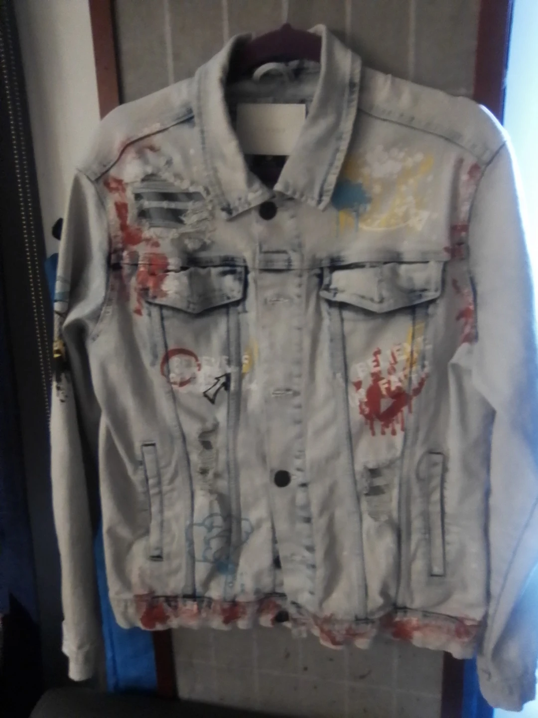 Light Wash Denim Jacket with Graffiti Print