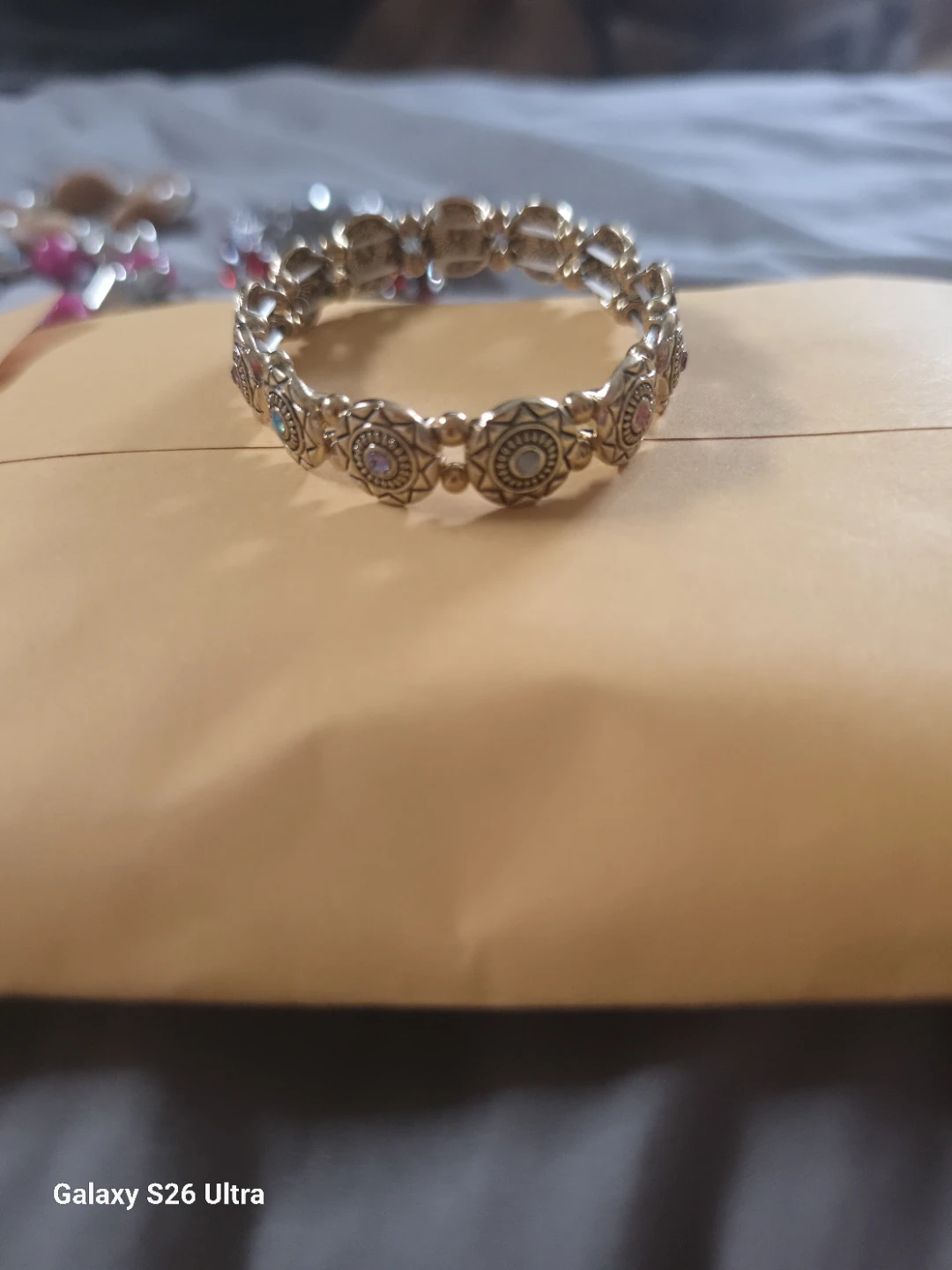 Gold Tone Elastic Bracelet with Faux Gems