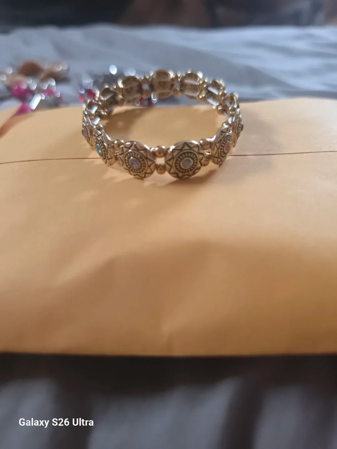 Gold Tone Elastic Bracelet with Faux Gems