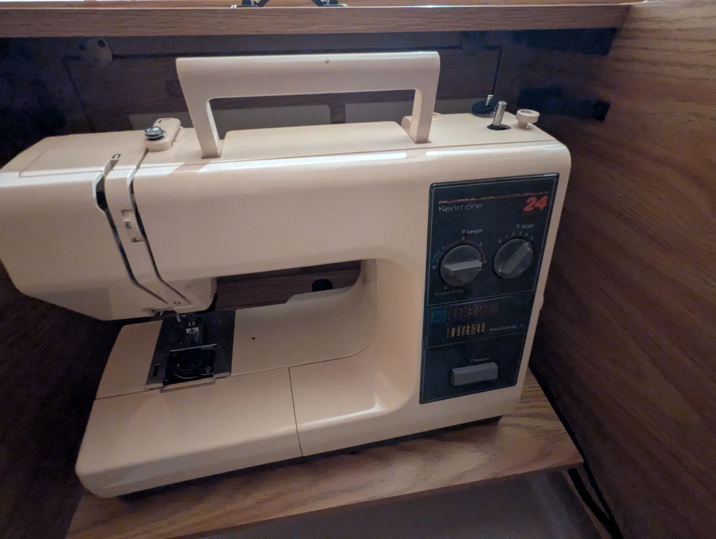 Kenmore 24 Sewing Machine with table and sewing materials