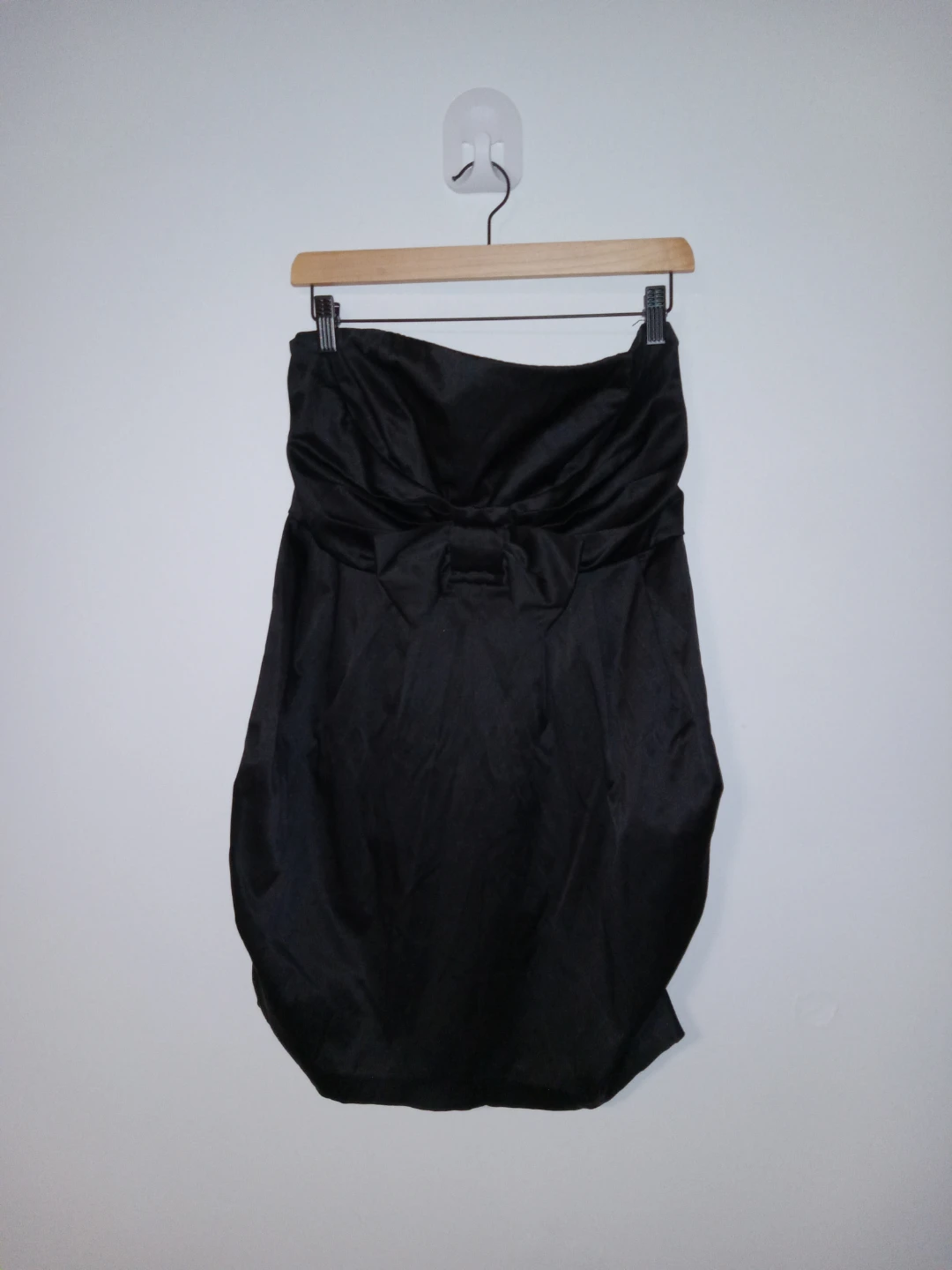 Black strapless dress with bow detail