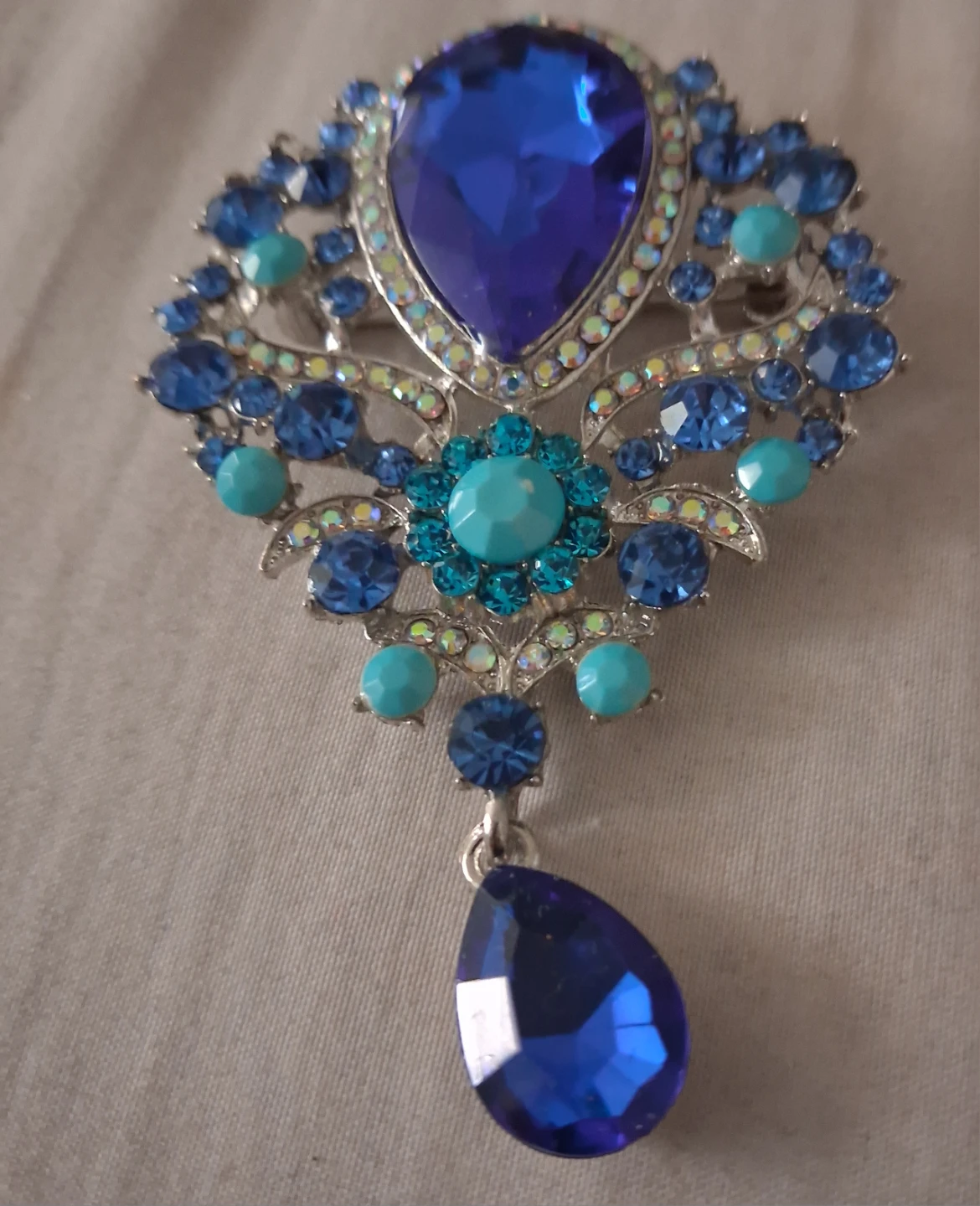 Sparkling Blue Gem Brooch with Dangle