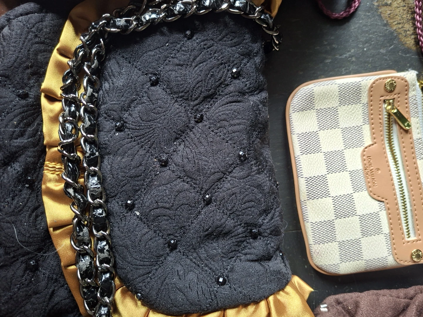 Assorted designer wallets and bags in wicker basket - photo 5