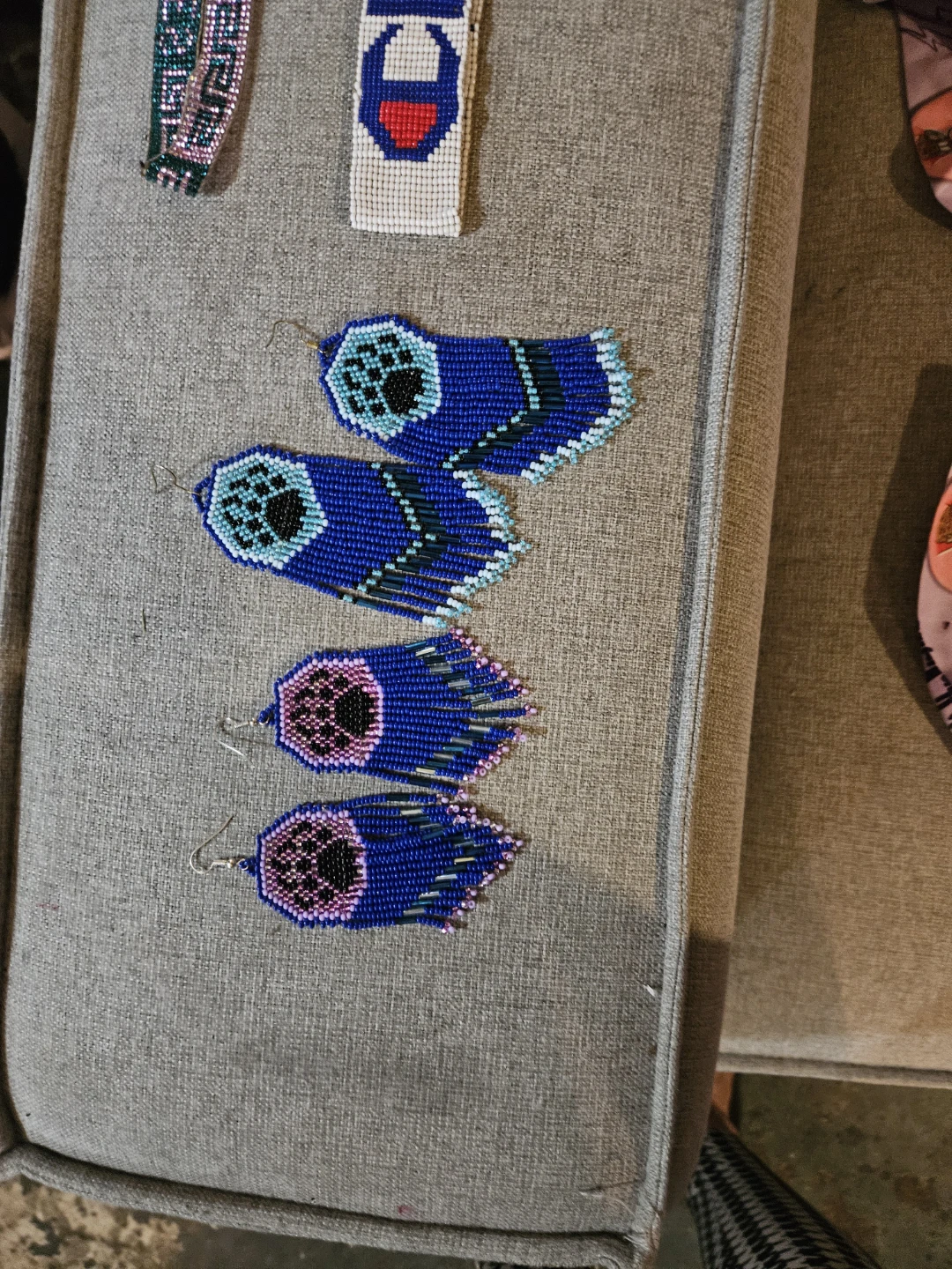 Blue Beaded Earrings with Paw Print Design