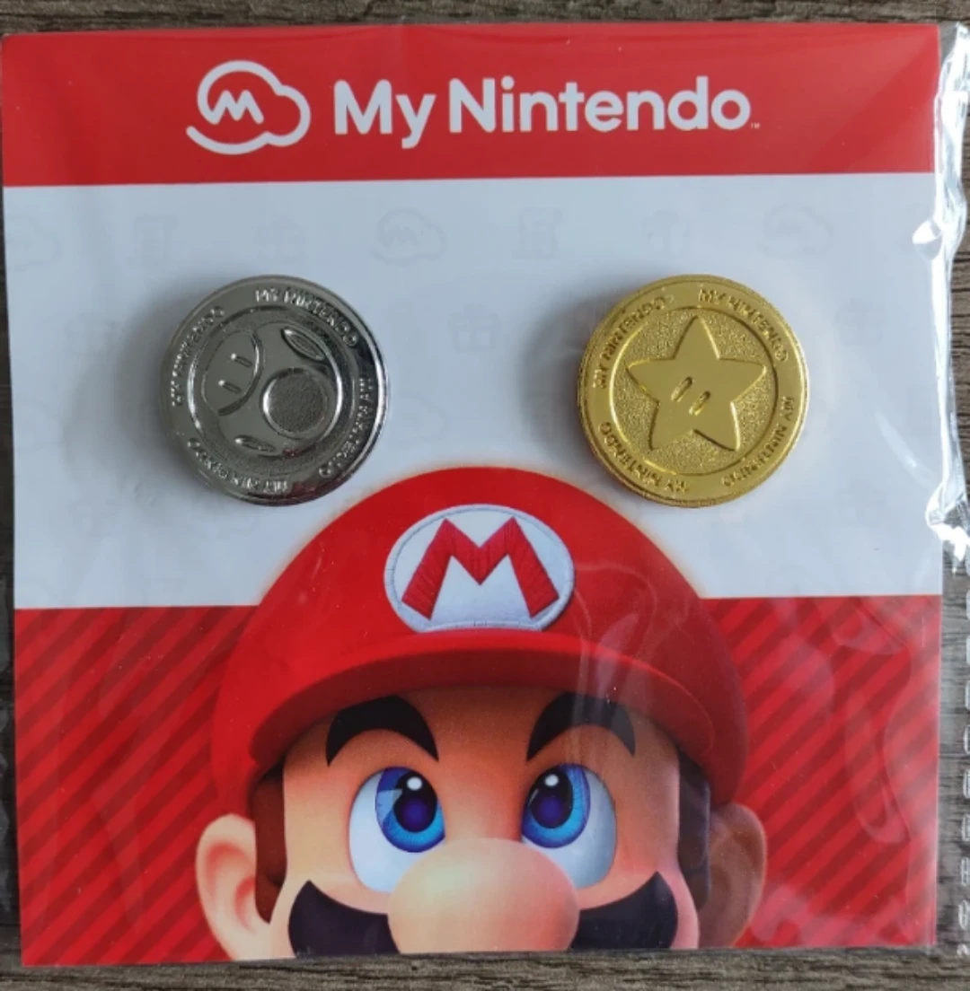 My Nintendo Mario Collectible Coins in gold and silver