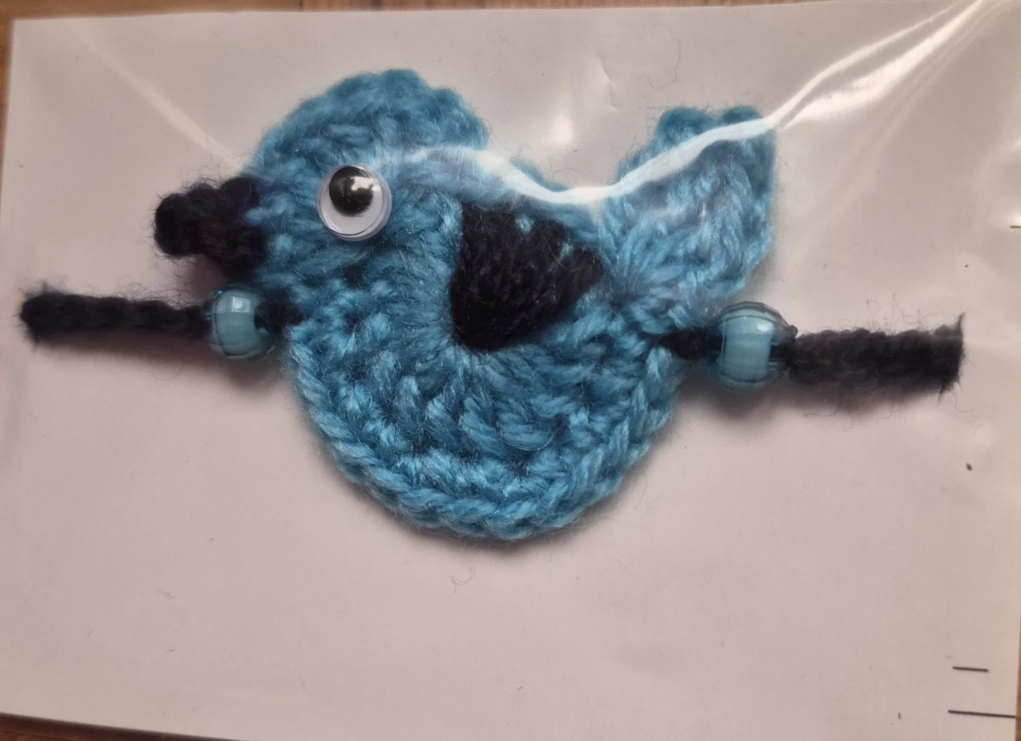 Handmade Crocheted Blue Bird Rakhi - photo 2