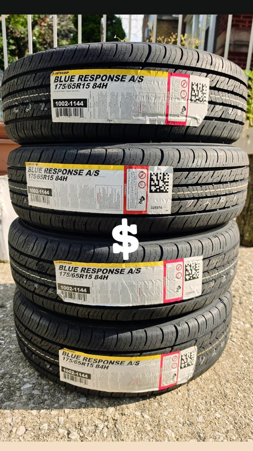 New Dunlop 175/65R15 tires x 4