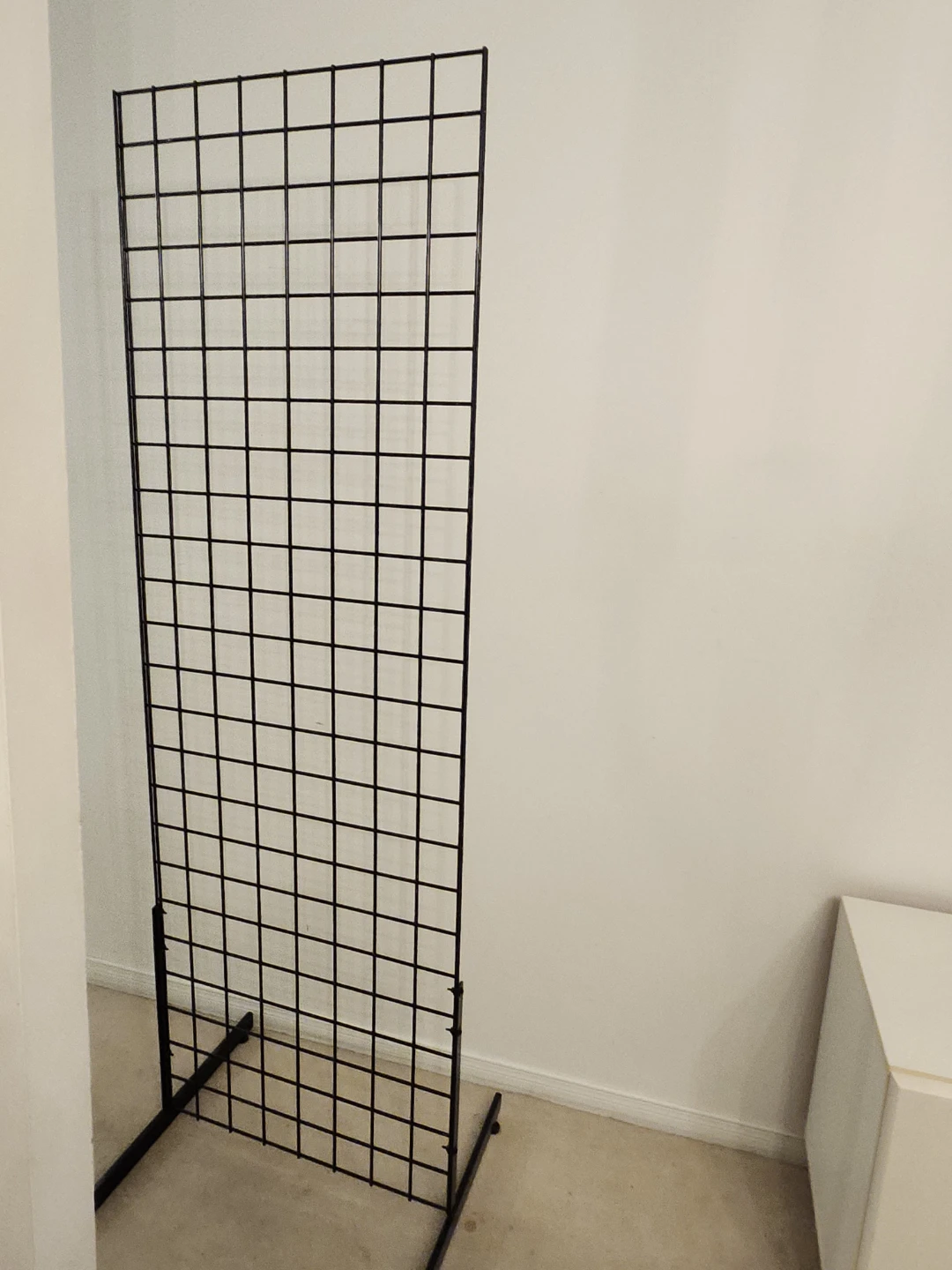 Black Metal Grid Display Panel with Baskets