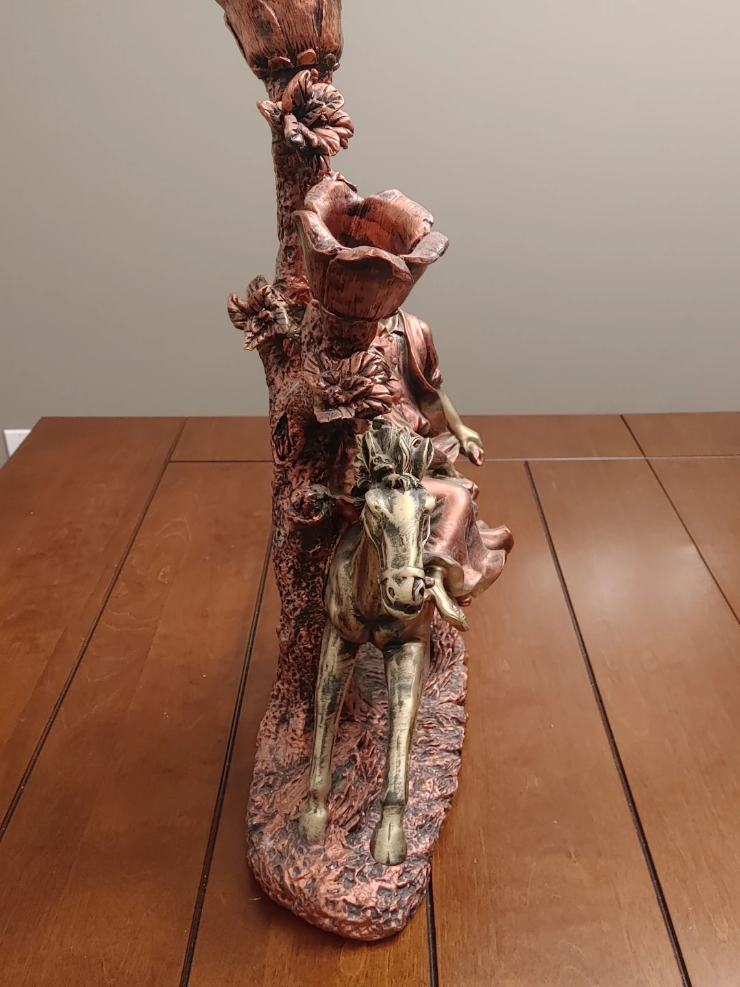Bronze-tone couple riding a horse sculpture - photo 3