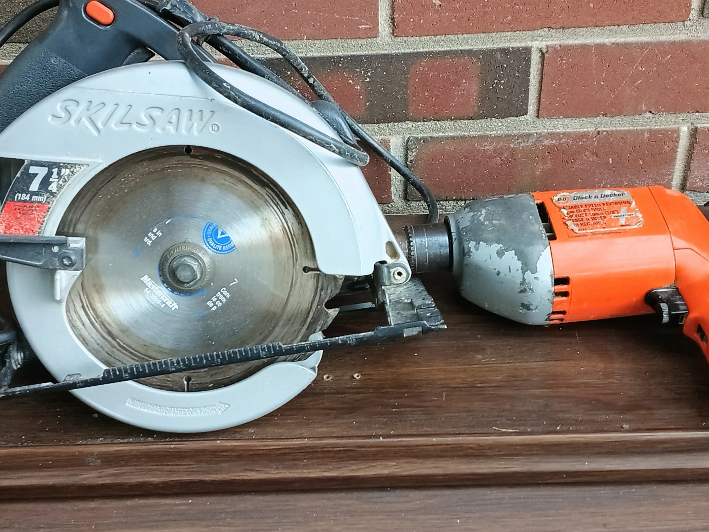 SkilSaw 7 1/4" Circular Saw and Black & Decker Drill