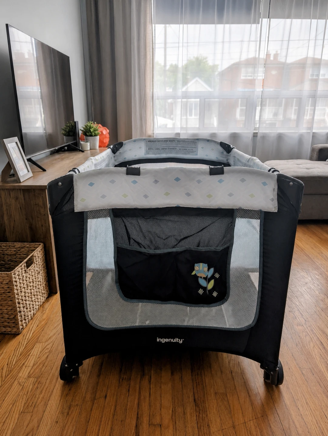 Ingenuity Playard with bassinet and changing pad
