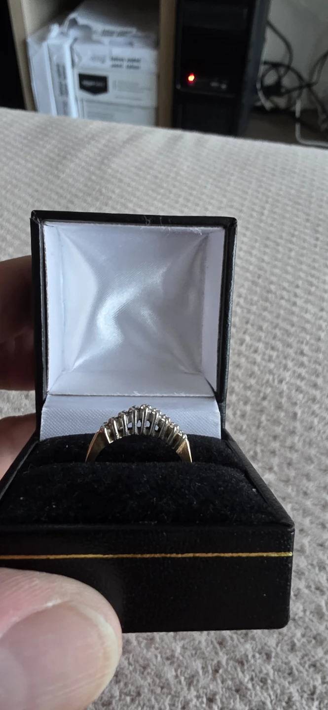 Gold-tone ring with diamonds