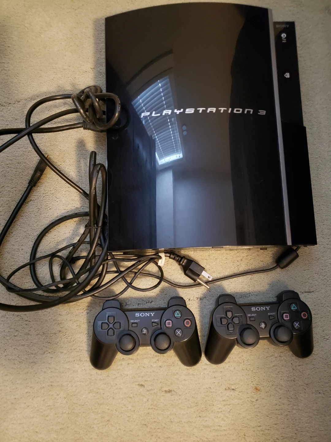 Sony PlayStation 3 Console with 2 Controllers