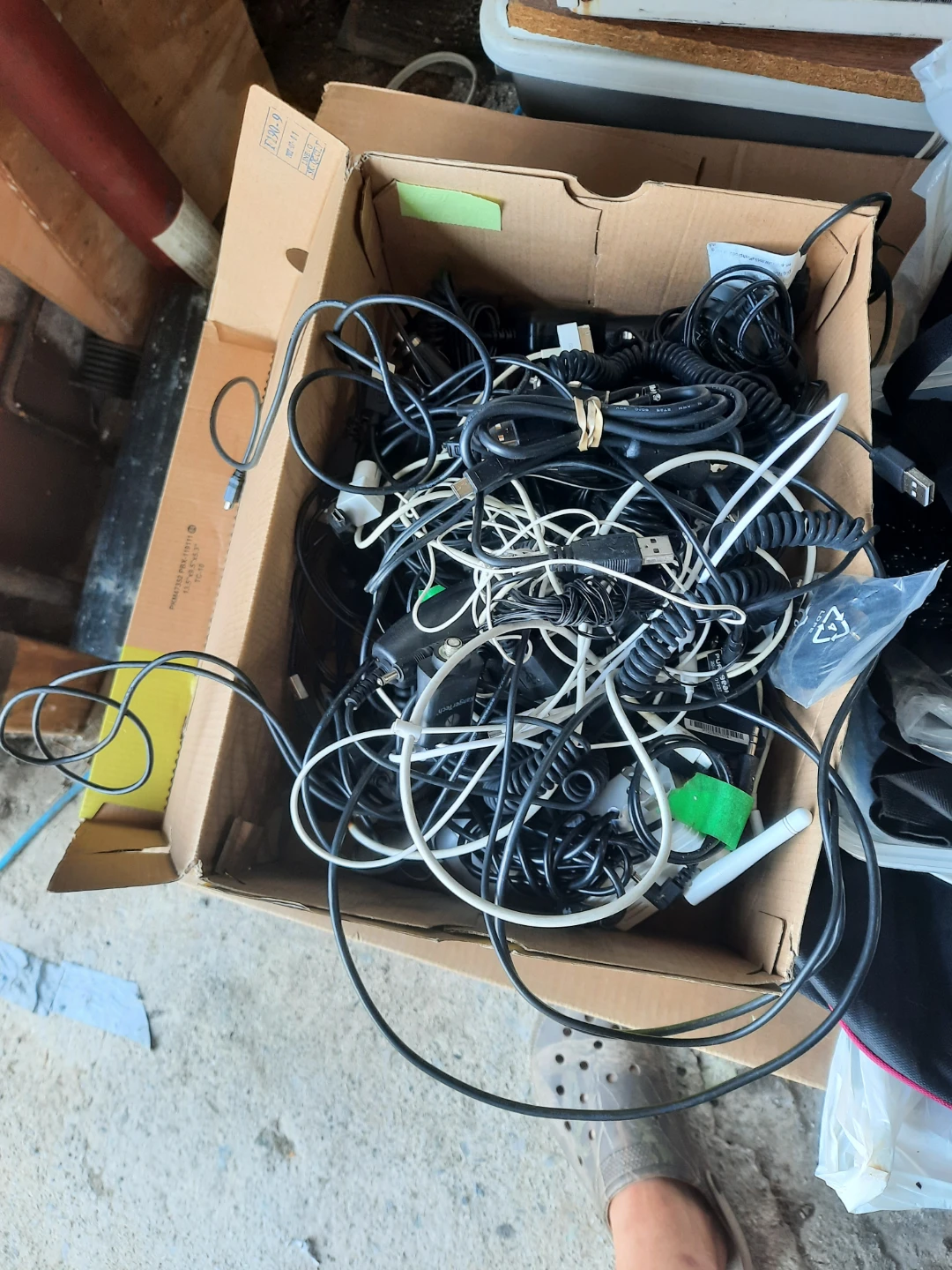 Box of Assorted Charging Cables and Adapters