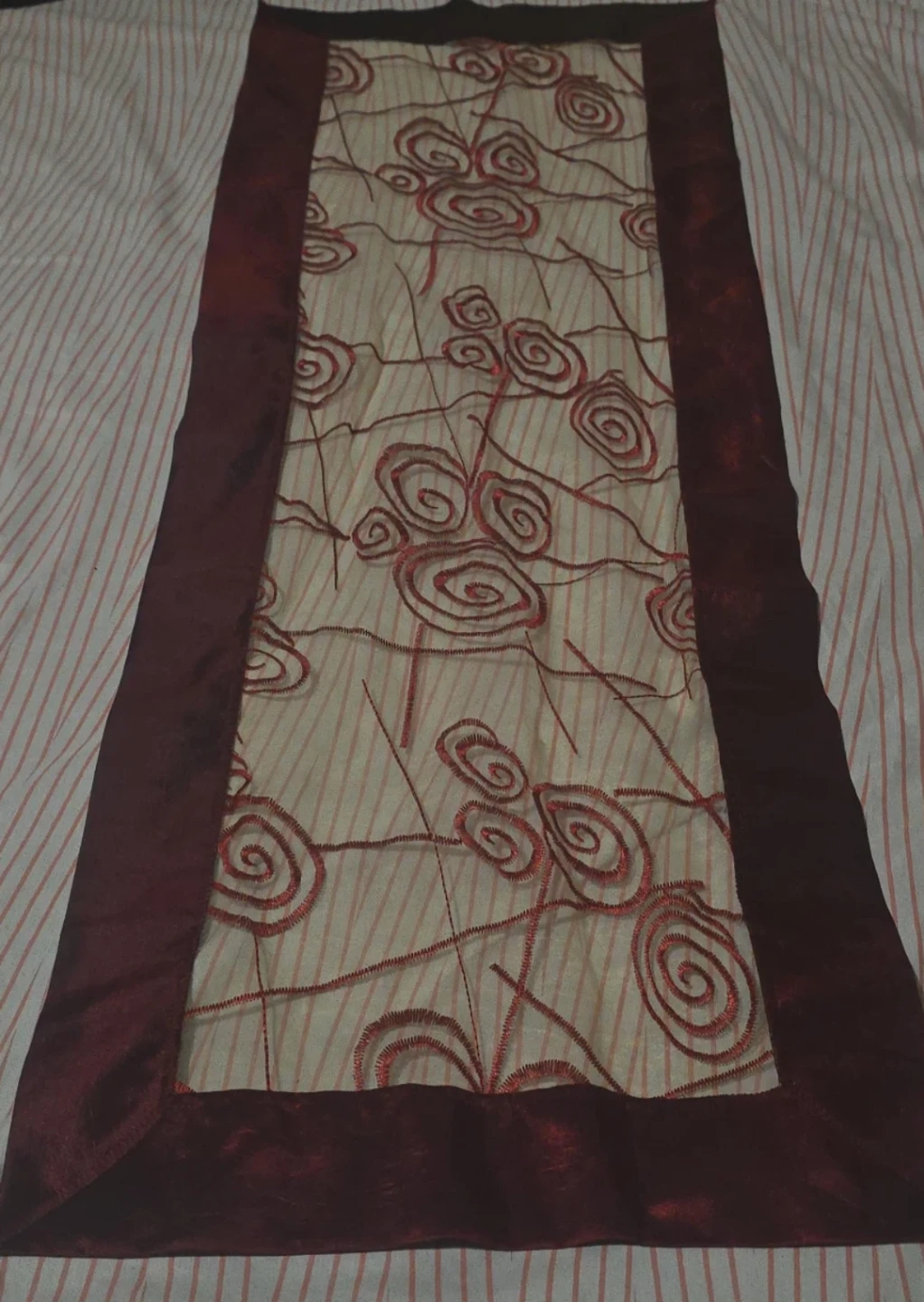 Decorative Table Runner with Floral Swirls