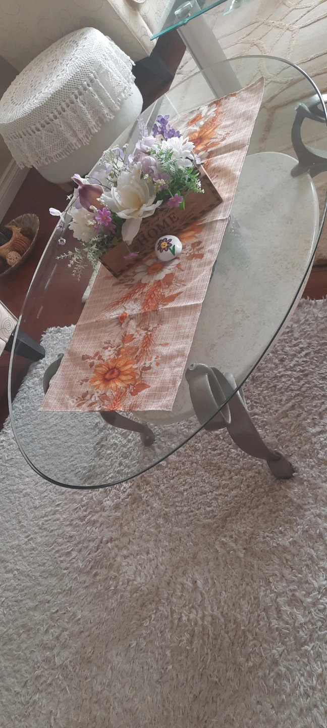 Glass Coffee Table with Decorative Legs