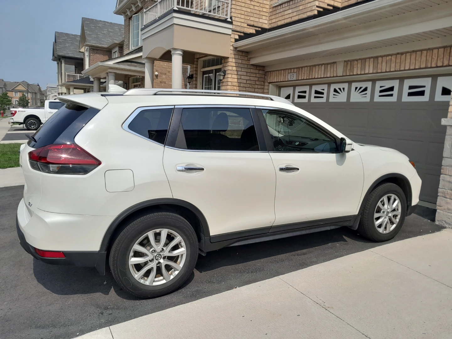White Nissan Rogue SV SUV