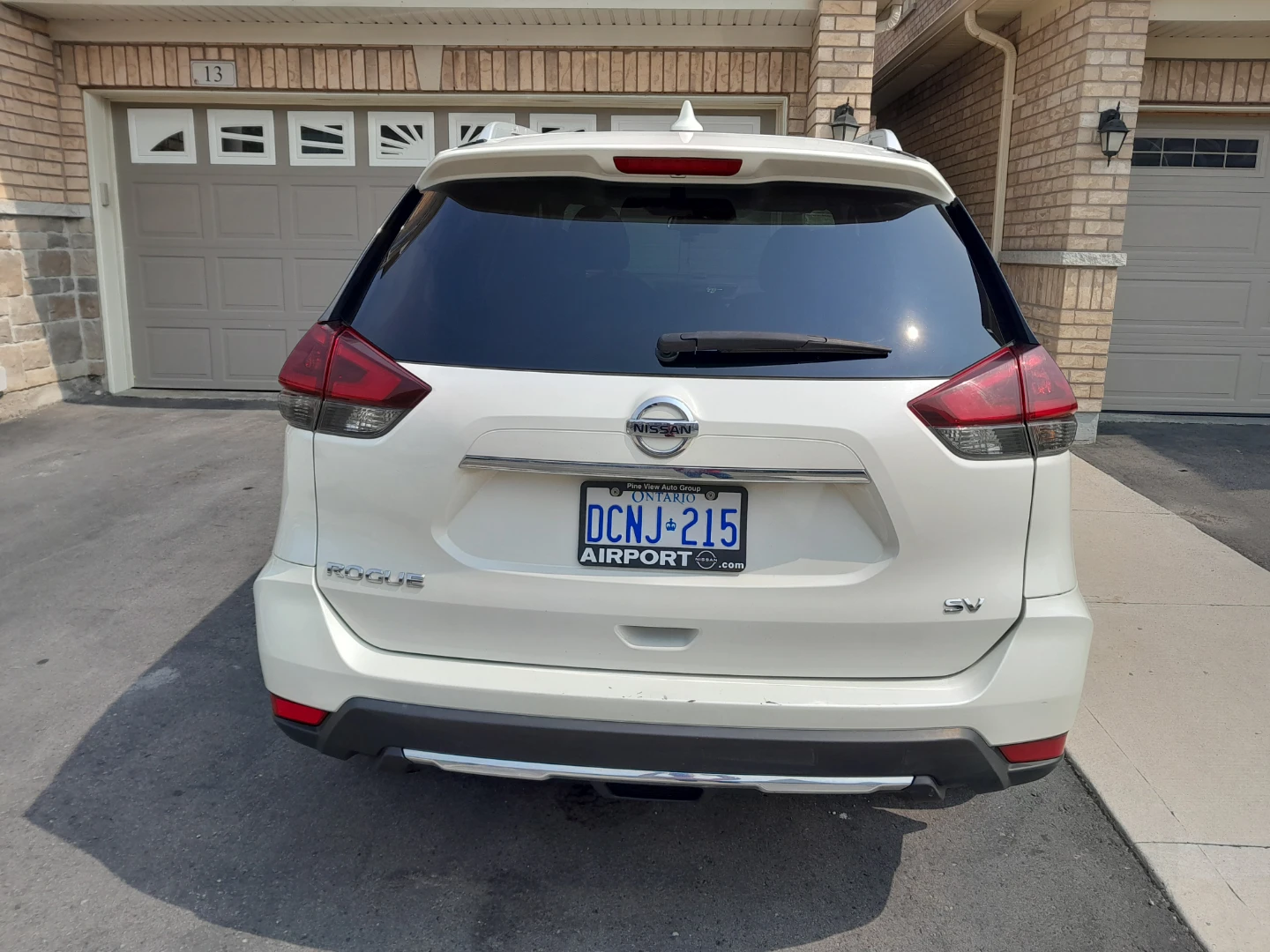 White Nissan Rogue SV SUV - photo 3