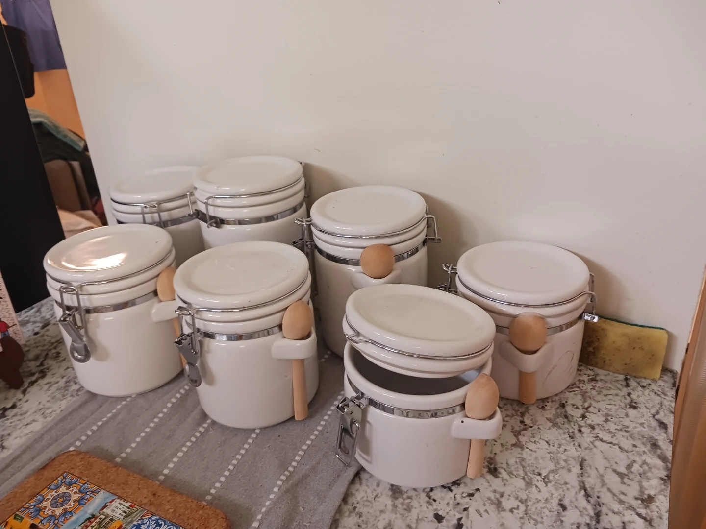 Set of 8 White Ceramic Canisters with Spoons
