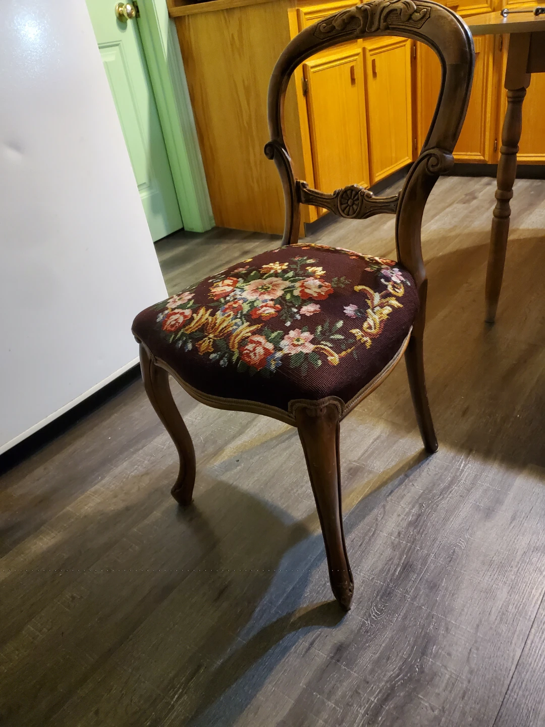 Antique Wooden Chair with Floral Upholstery