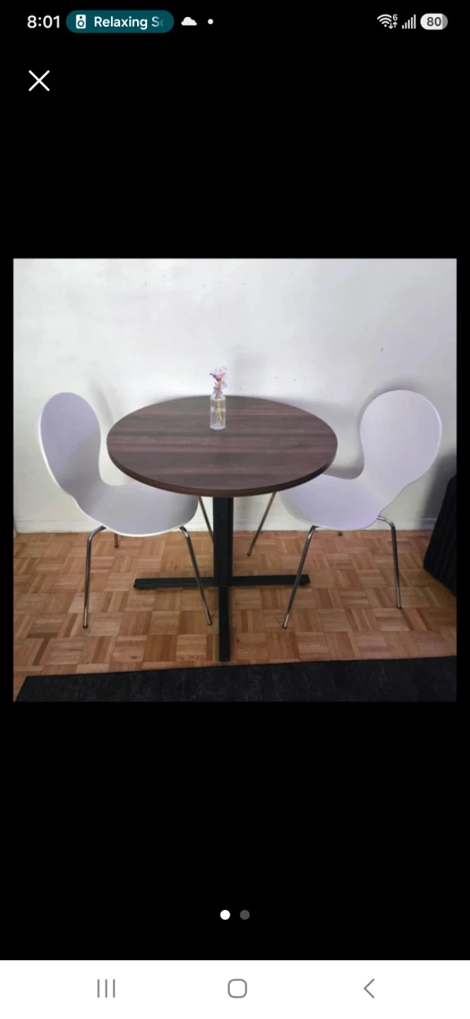 Dinning table and ikea two chairs .