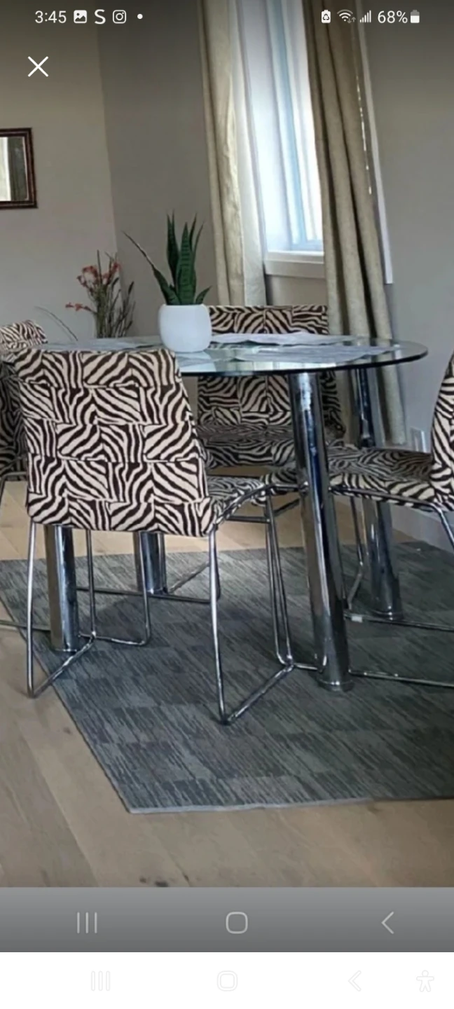 Glass top dining table with 4 chairs