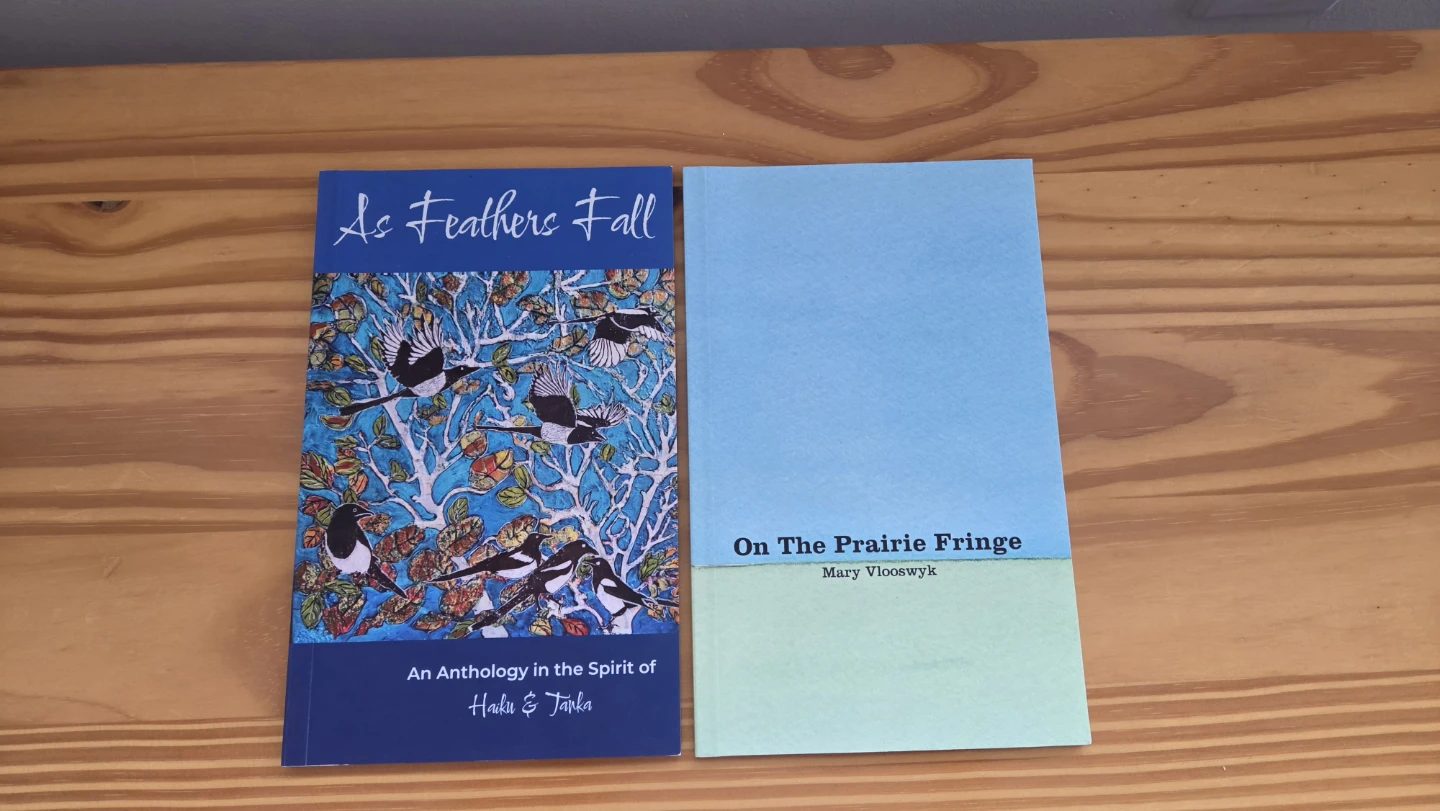 Poem books, As Feathers Fall Anthology & On the Prairie Fringe