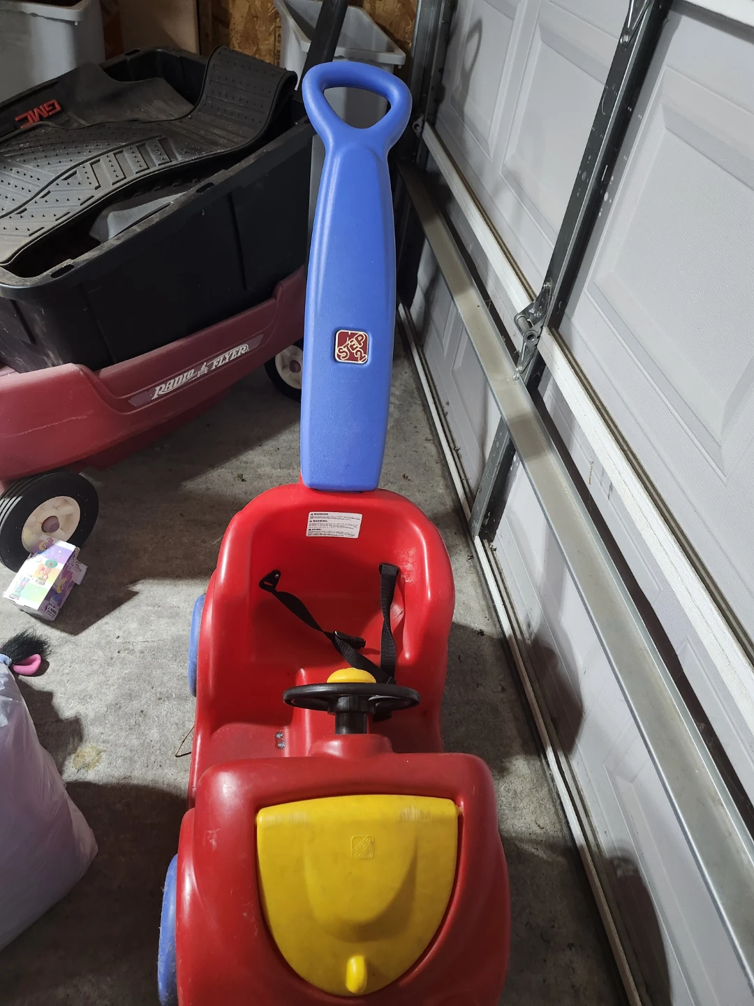 red and blue Step2 Push Around Buggy needs cleaning