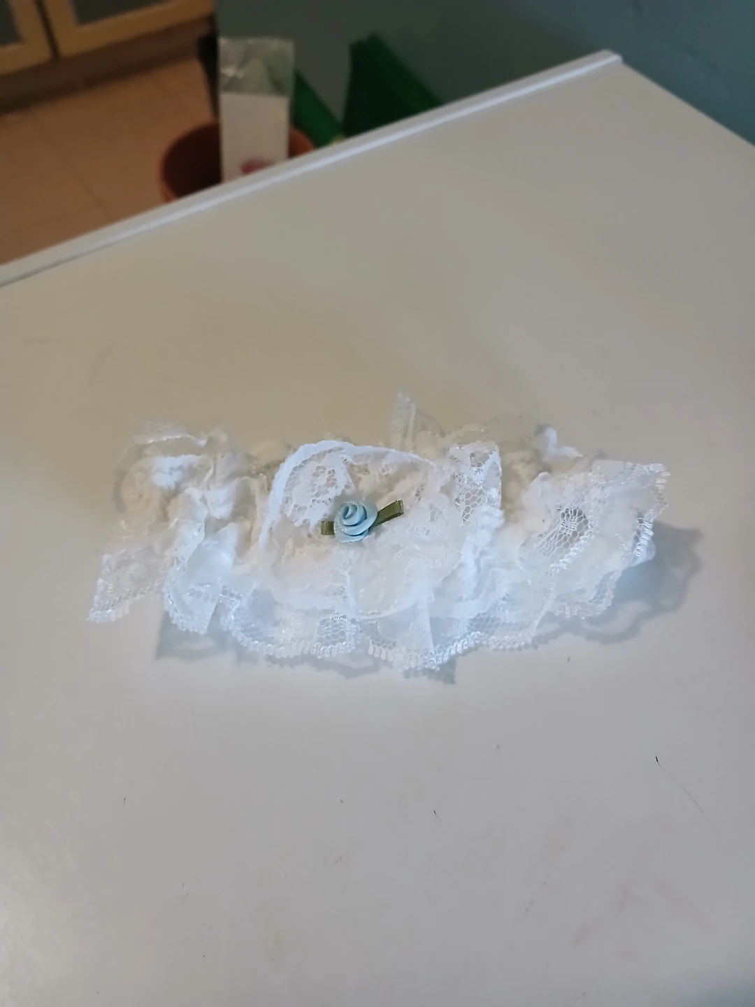 White Lace Garter with Blue Flower Accent