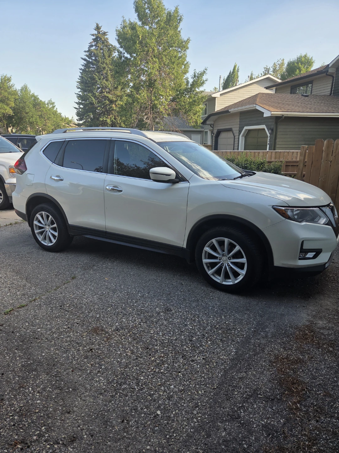 White Nissan Rogue SUV