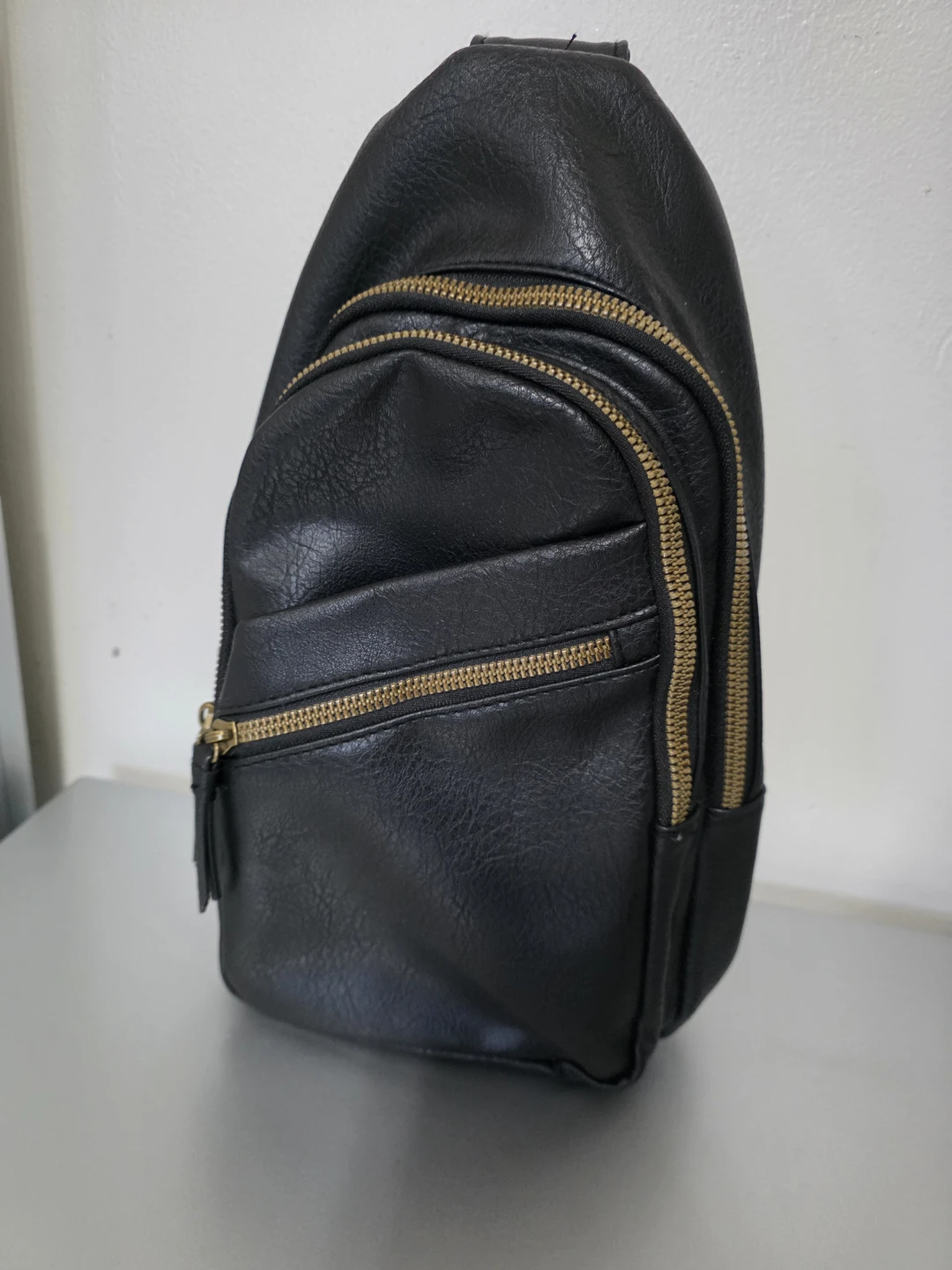 Black Faux Leather Sling Backpack