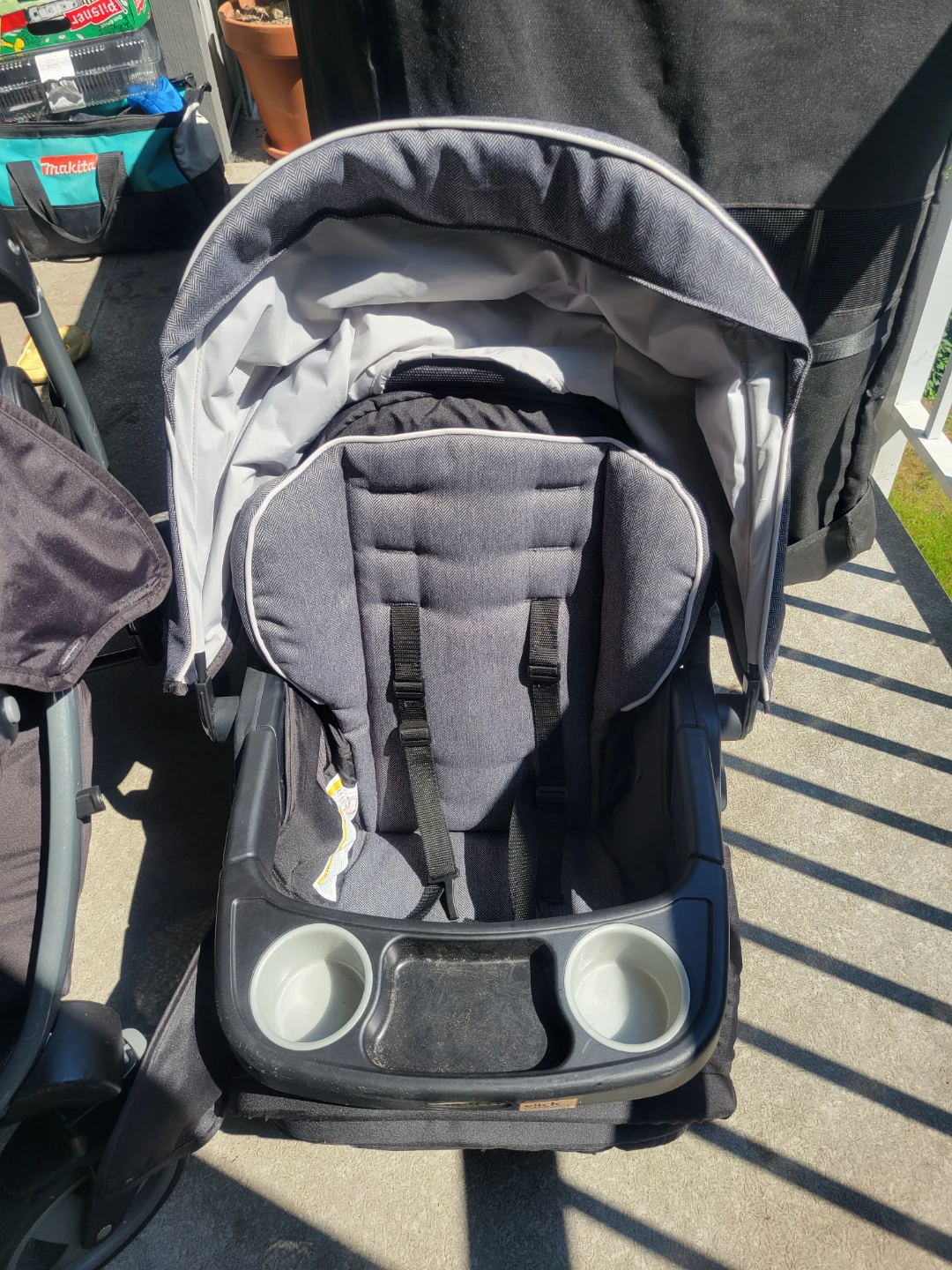 Graco click stroller with extra seat.
