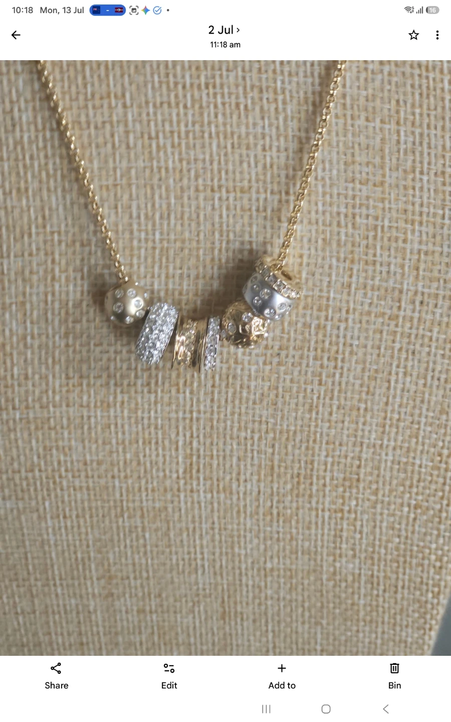 Gold-tone necklace with decorative charms - photo 2