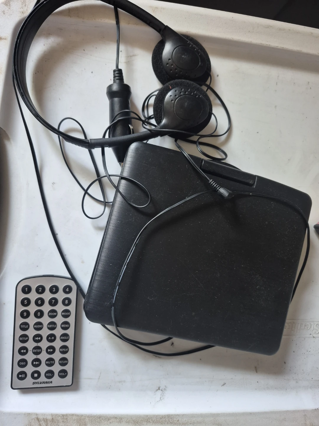 Sylvania Portable DVD Player with Headphones and Car Charger - photo 2