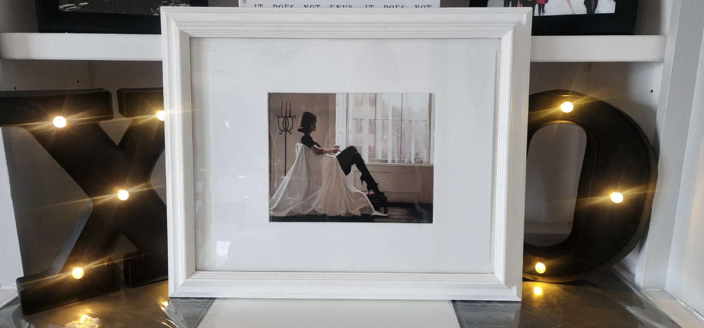 Framed Art Print of Woman by Window