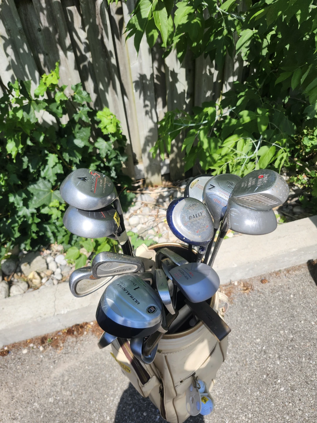 Bulk lot of Golf Clubs