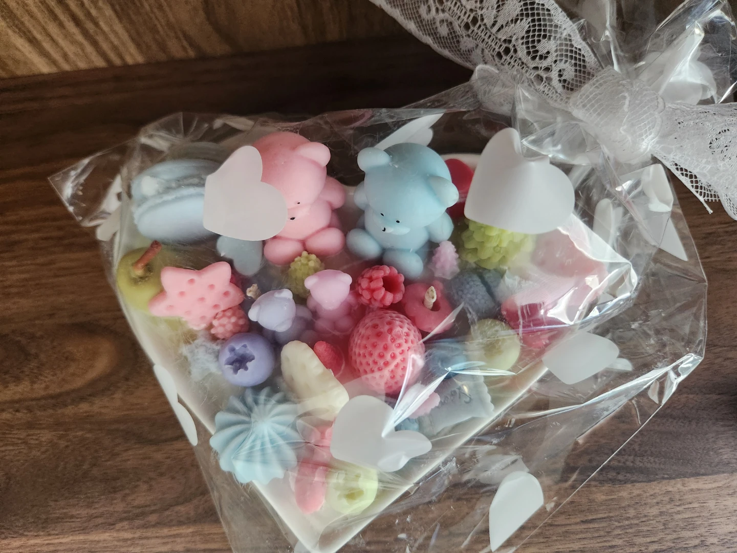 Heart-shaped candle with decorative elements
