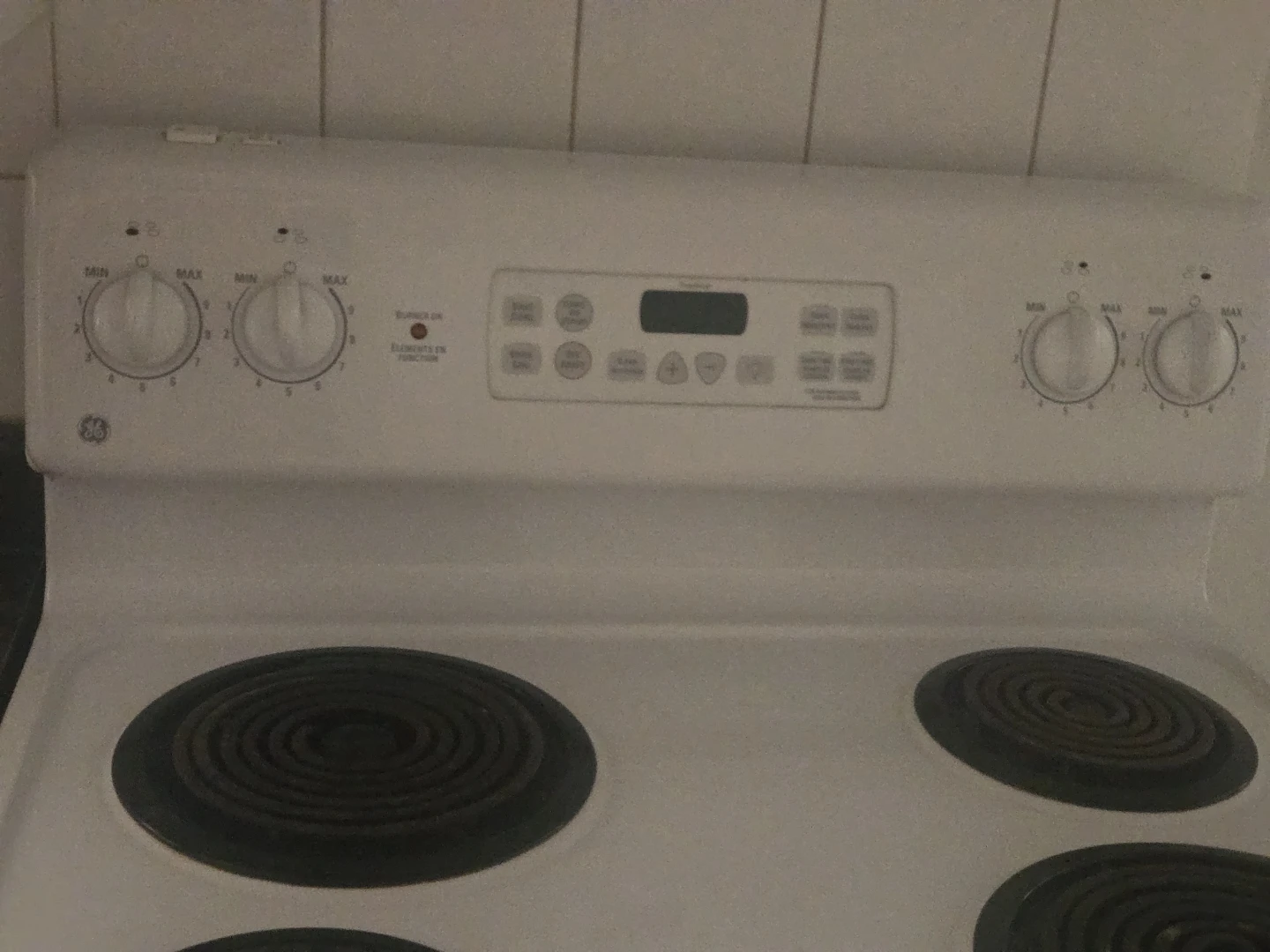 GE Electric Coil Top Stove with Oven - photo 2