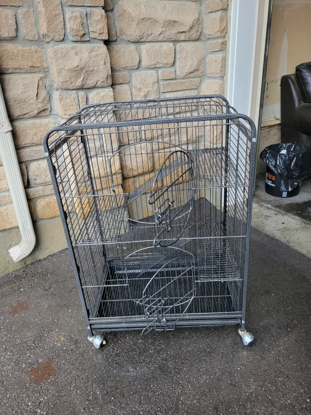 Small animal cage on wheels with hammock
