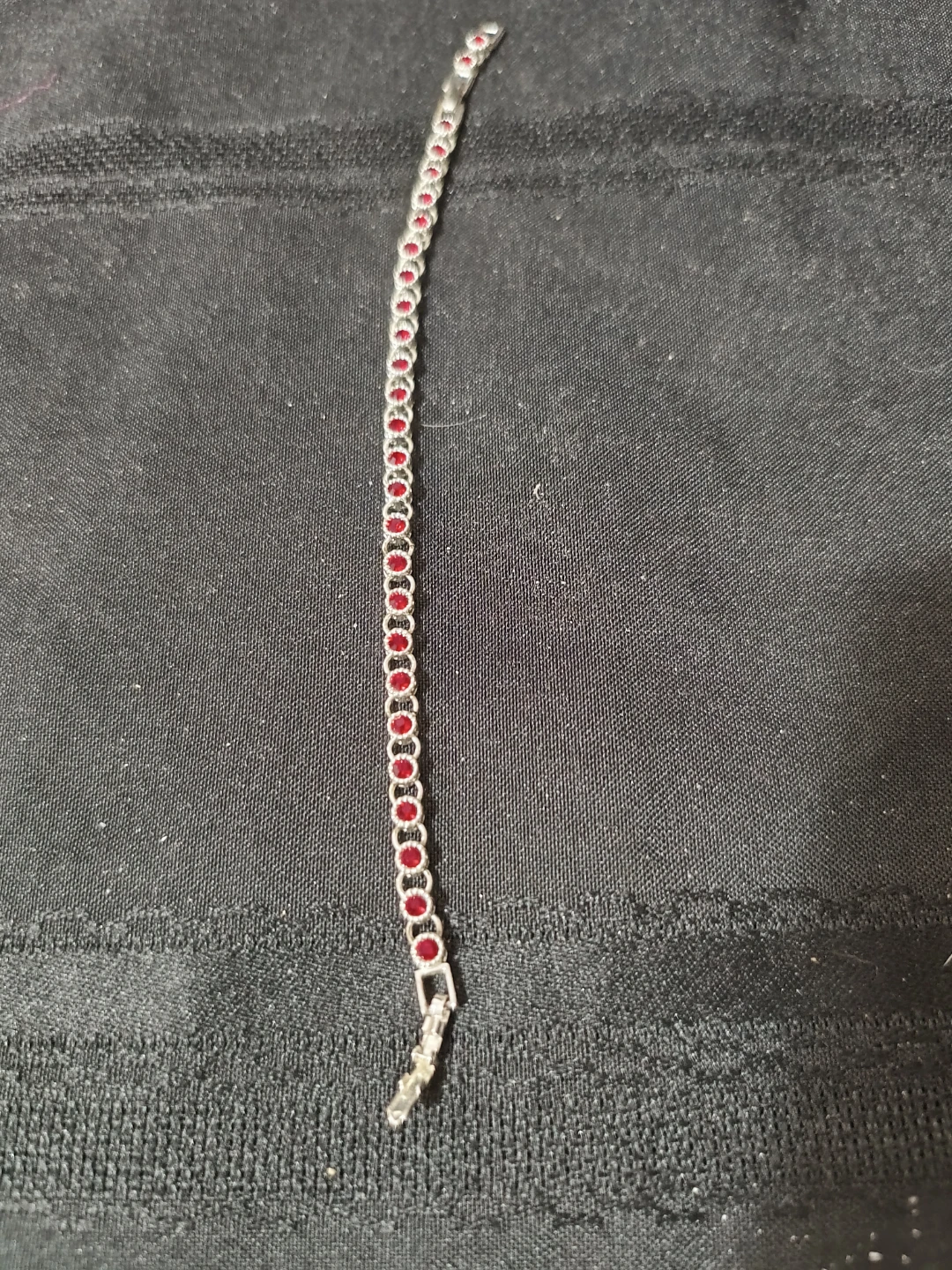 Silver-toned Bracelet with Red Stones