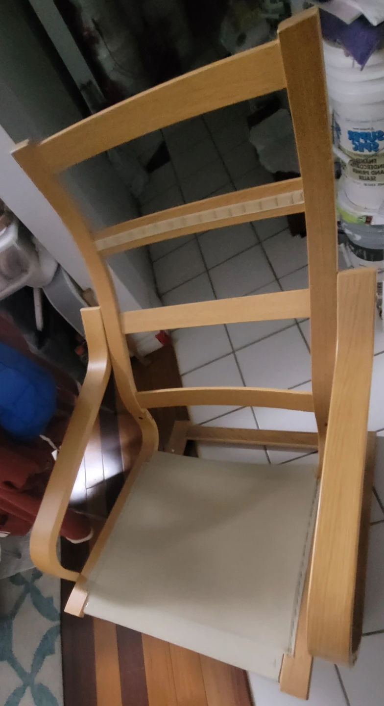 Wooden rocking chair with fabric seat