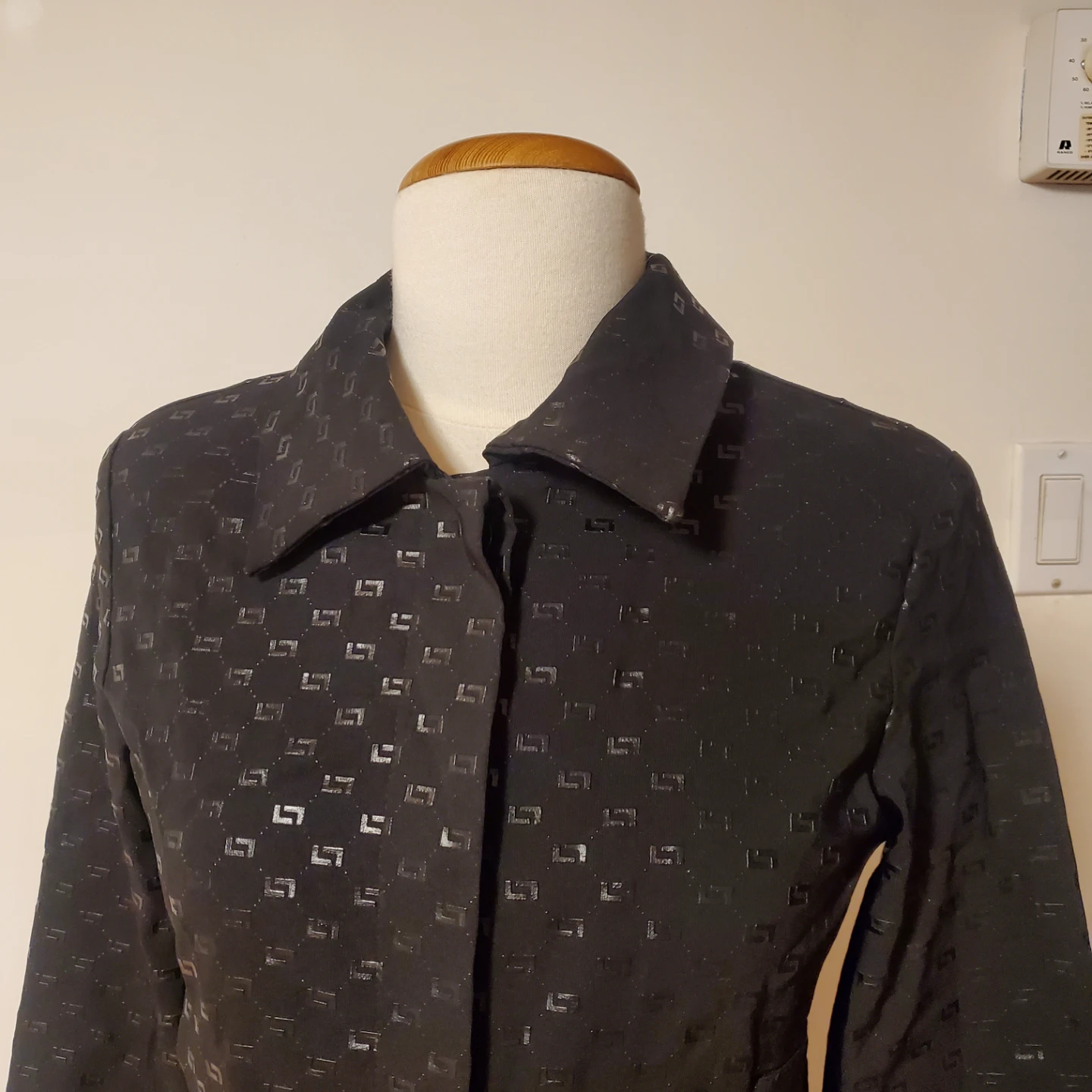 Black patterned button-up jacket