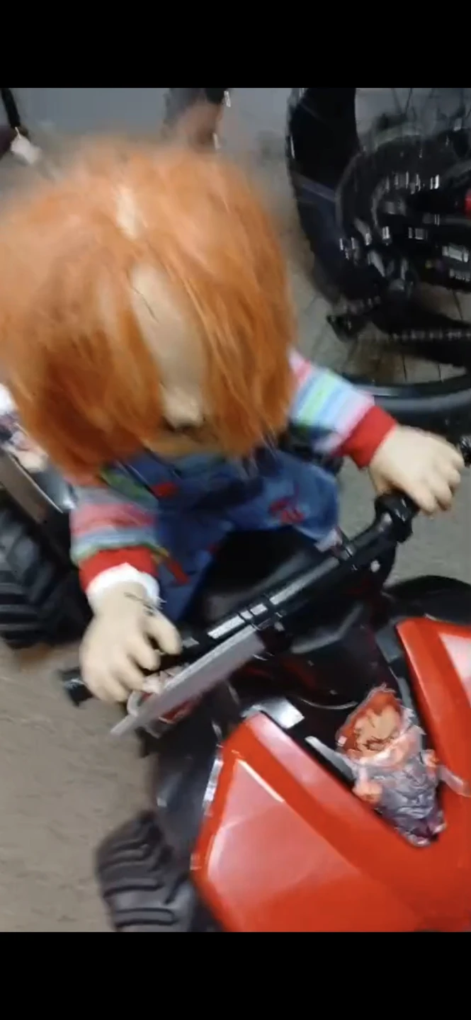 Chucky Doll on Traxxas XMAXX w/ ATV Body