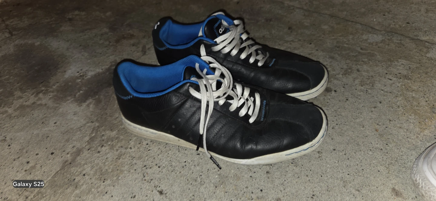 Adidas black sneakers with blue interior