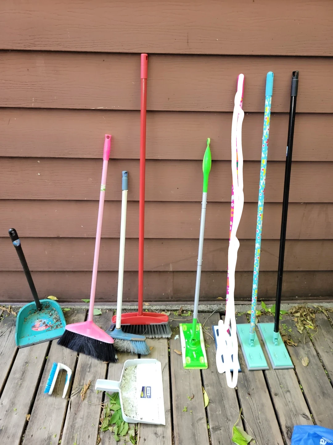 $2 each Brooms and Mops