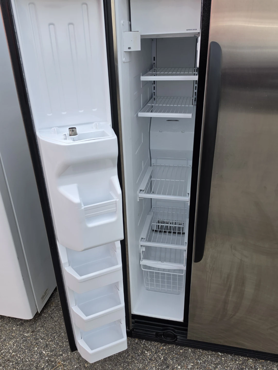 GE Stainless Steel Side-by-Side Refrigerator - photo 2
