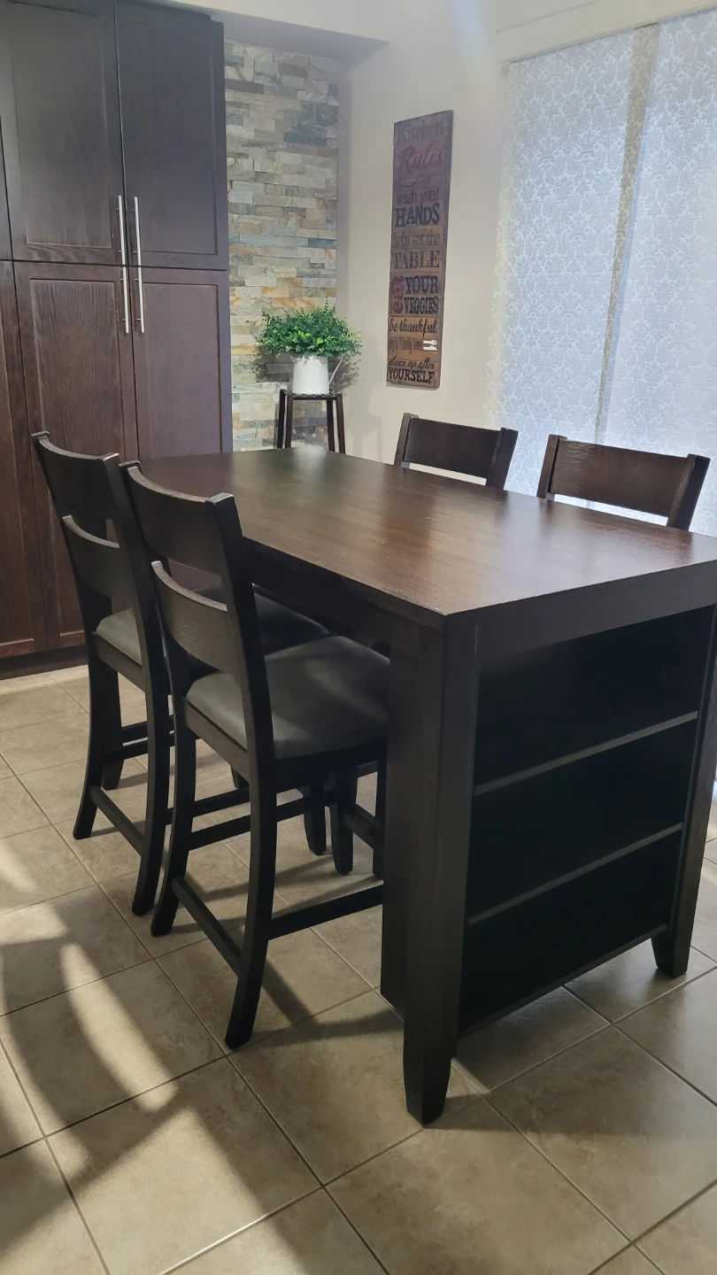 Counter height table for 4 with 4 high chairs.