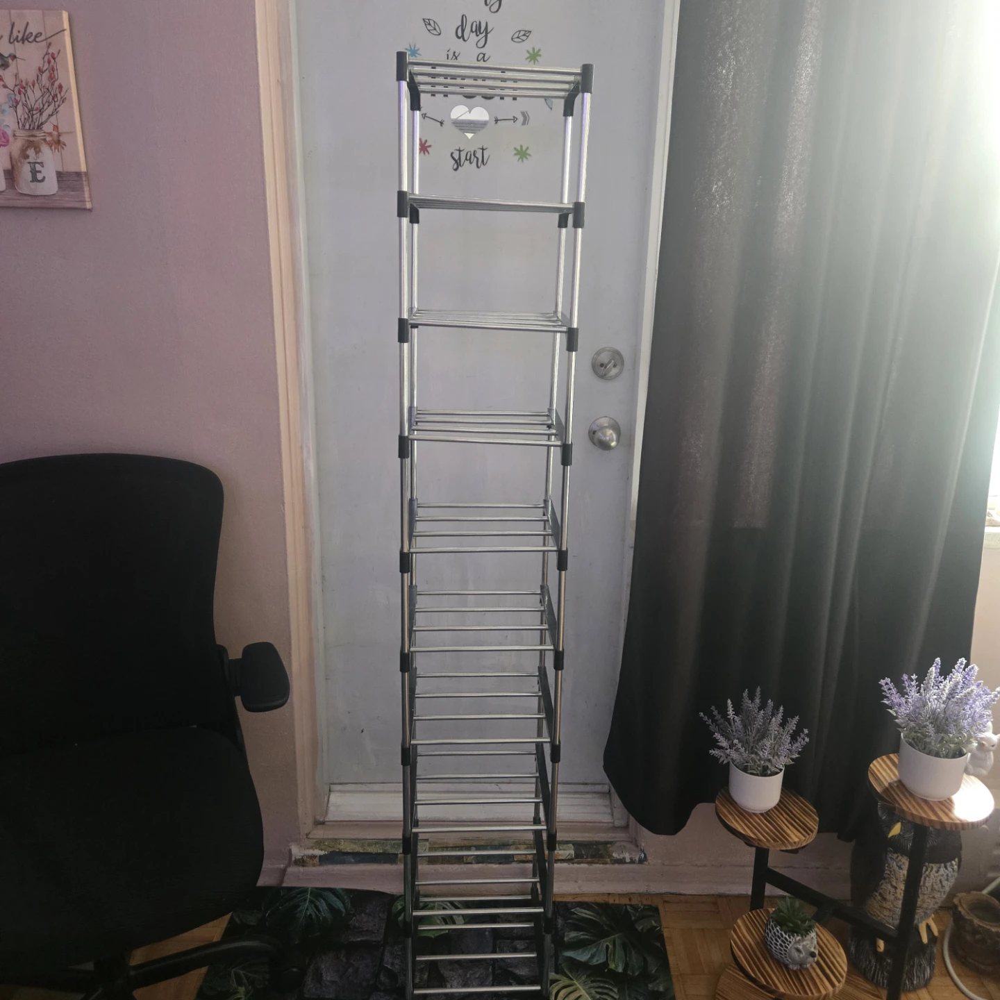 Tall narrow shoe rack .
