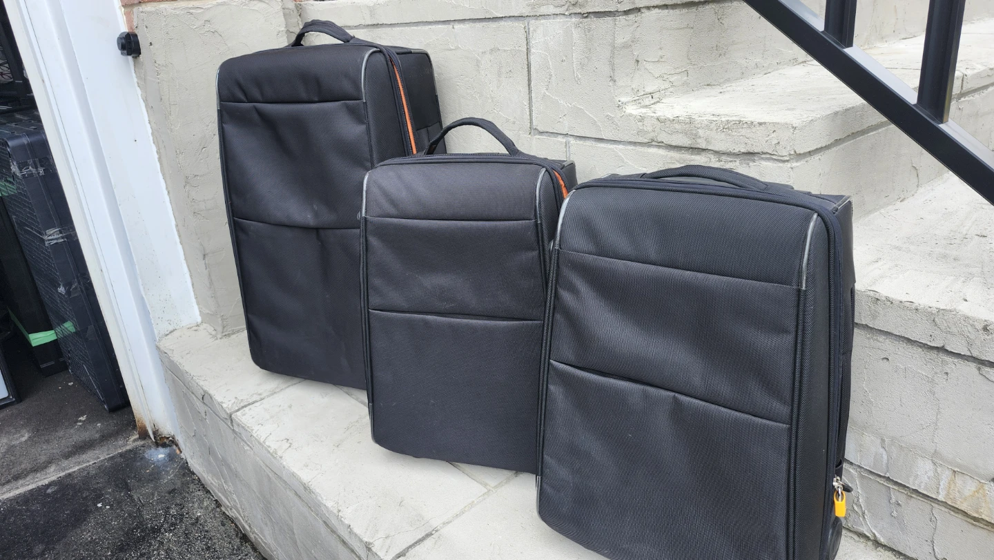 Set of 3 Black Rolling Suitcases